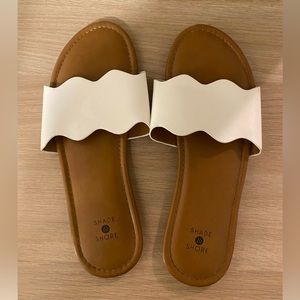 White slip-on sandals